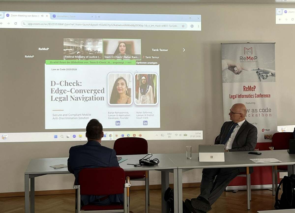Team D-Check pitching via video conference, projected onto the screen